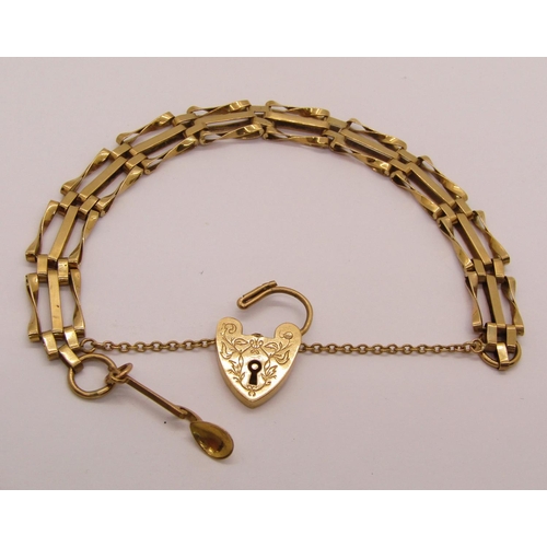 1299 - 9ct twisted gate link bracelet with engraved heart padlock clasp and Welsh love spoon charm, 12.6g