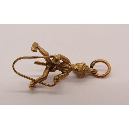 1321 - Collection of 9ct jewellery comprising a pixie charm and various earrings, plus a yellow metal ankh ... 