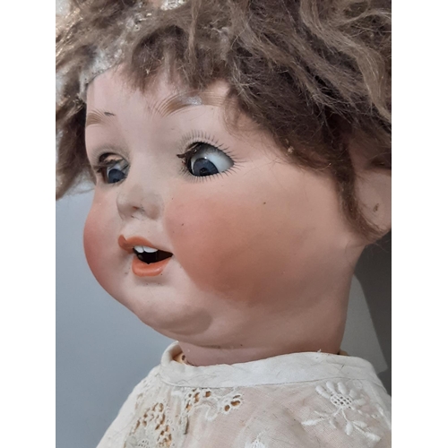 371 - Early 20th century German bisque head character doll by Ernst Heubach for restoration, with bent lim... 