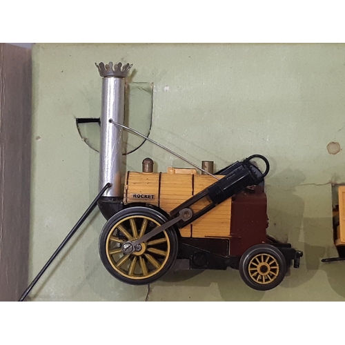 386 - 1960's Tri-ang boxed model Stephenson's Rocket R346 and coach R621, with inner card packaging and we... 