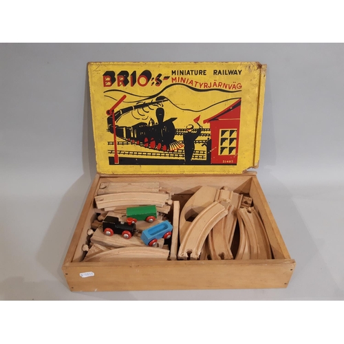 332 - Vintage toys including 'Giner' pond yacht, large multi levelled toy garage, (both for restoration), ... 