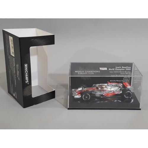 347 - 24 boxed Formula 1 racing cars by Minichamps (Paul's Model Art), all 1:43 scale displaying vehicles ... 