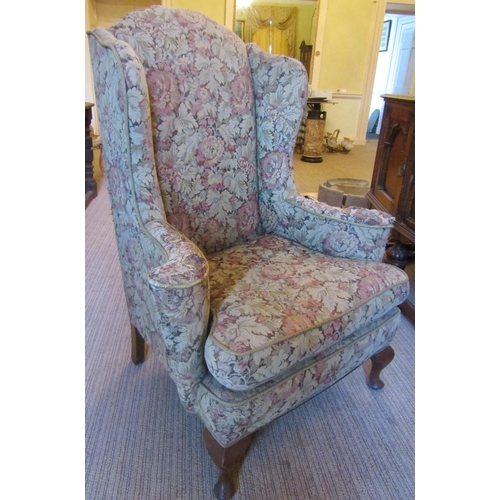 2568 - To be viewed at and collected from Nibley House GL11 6DL: A Georgian style wing chair with swept arm... 