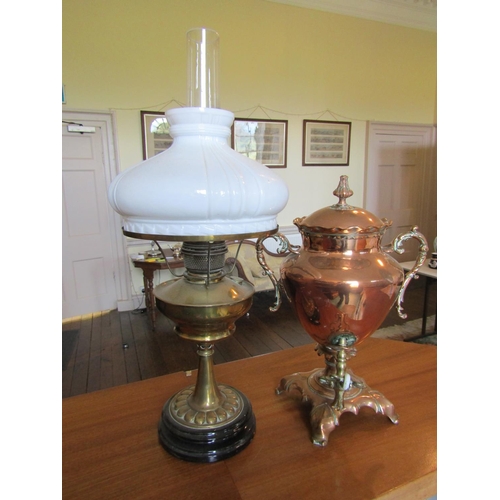 2587 - To be viewed at and collected from Nibley House GL11 6DL: A brass oil lamp with milk white shade tog... 