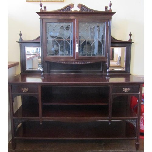 2590 - To be viewed at and collected from Nibley House GL11 6DL: An Edwardian mahogany side cabinet the low... 