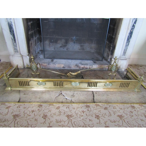 2595 - To be viewed at and collected from Nibley House GL11 6DL: A Victorian brass fire curb, two fire dogs... 