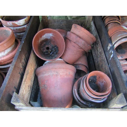 2019 - Three vintage wooden crates containing a quantity of terracotta flower pots of varying size approxim... 