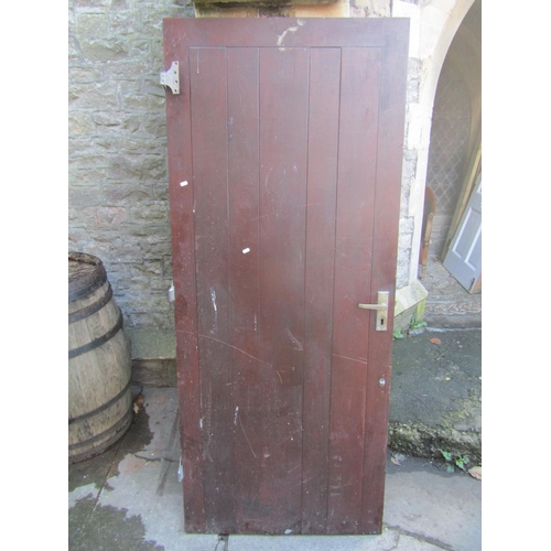 2041 - A reclaimed contemporary stained hardwood front door, 2 metres high x 83 cm wide