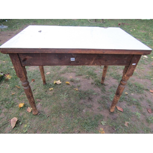 2048 - A Victorian stained pine kitchen table of rectangular form with later formica top, 107 cm x 68 cm (a... 