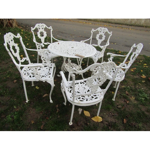 2049 - A painted cast aluminium circular garden terrace table 72 cm diameter, together with a set of five a... 