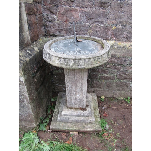 2052 - A four sectional garden sun dial, the large circular weathered brass/possibly bronze dial with scrip... 