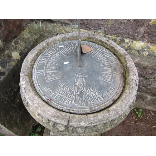 2052 - A four sectional garden sun dial, the large circular weathered brass/possibly bronze dial with scrip... 