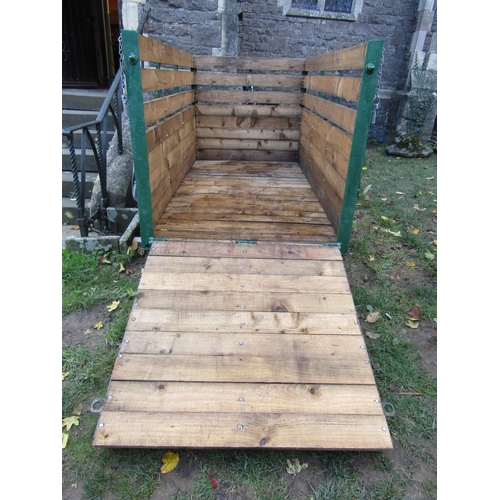 2058 - A livestock/sheep trailer with iron and timber slatted frame, the main body approx 2 metres long x 1... 