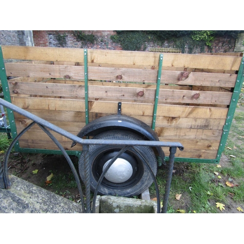 2058 - A livestock/sheep trailer with iron and timber slatted frame, the main body approx 2 metres long x 1... 