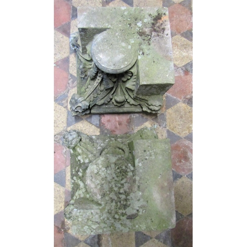 2081 - A pair of weathered carved natural stone architectural corner capitals with scrolling foliate detail... 