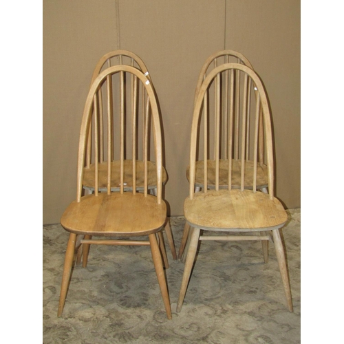 2183 - A set of four stripped Ercol Quaker elm and beechwood high hoop and stick back dining chairs