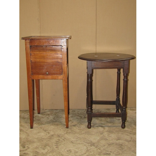 2197 - A walnut and figured walnut veneered fold over top card table with serpentine outline, raised on tur... 