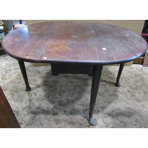 2201 - A Georgian mahogany oval drop leaf pad foot dining table 110 cm wide x 132 cm (open) together with a... 