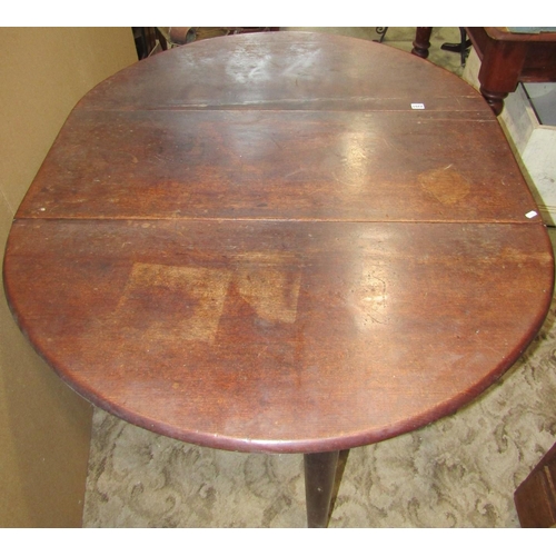 2201 - A Georgian mahogany oval drop leaf pad foot dining table 110 cm wide x 132 cm (open) together with a... 