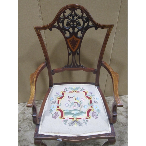 2223 - An inlaid Edwardian mahogany lightweight open elbow chair, the shield shaped back with pierced fretw... 