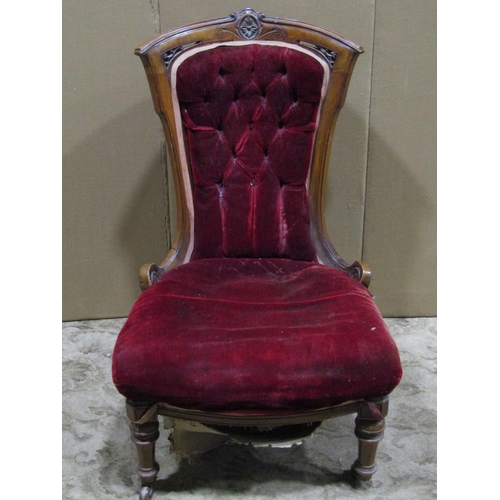 2246 - A Victorian ladies drawing room chair with upholstered seat and button back within a walnut show-woo... 