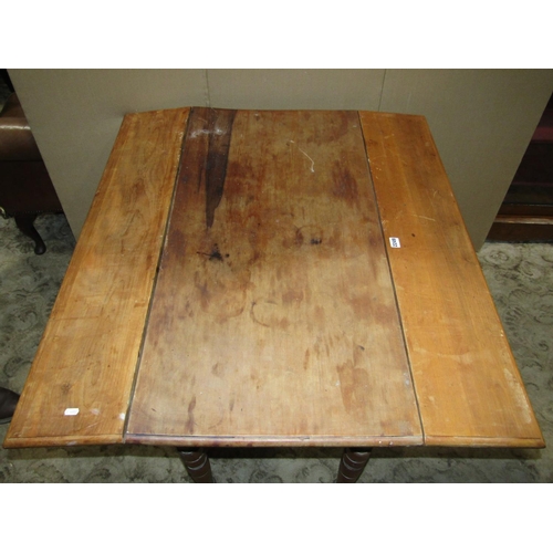 2249 - An Edwardian walnut drop leaf kitchen table with end frieze drawer raised on ring turned and tapered... 