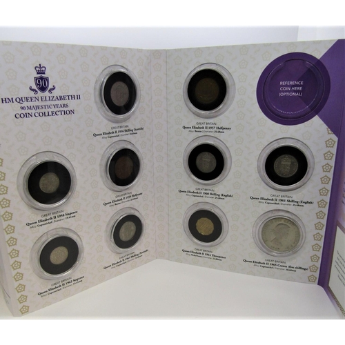 521 - Boxed set 9 volumes H M Queen Elizabeth II 90 Majestic years coin collection