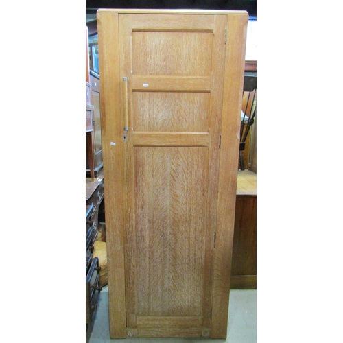 2289 - A small limed oak linen cupboard enclosed by two doors over two long drawers, 75 cm wide together wi... 