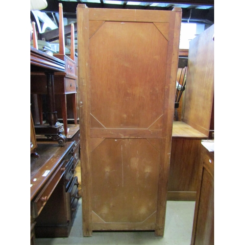 2289 - A small limed oak linen cupboard enclosed by two doors over two long drawers, 75 cm wide together wi... 