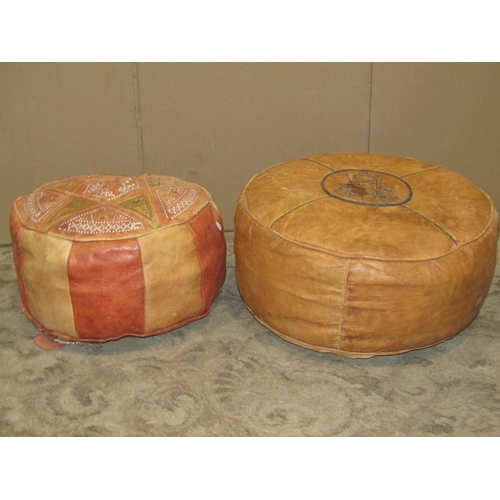 2309 - A small stitched leather circular pouffe with woven geometric design, together with two others (3)