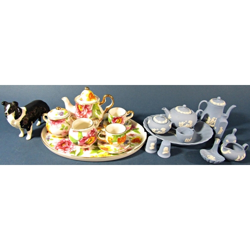 1128 - A large collection of miniature ceramics in a Victorian style including Wedgwood Jasperwares, Coalpo... 