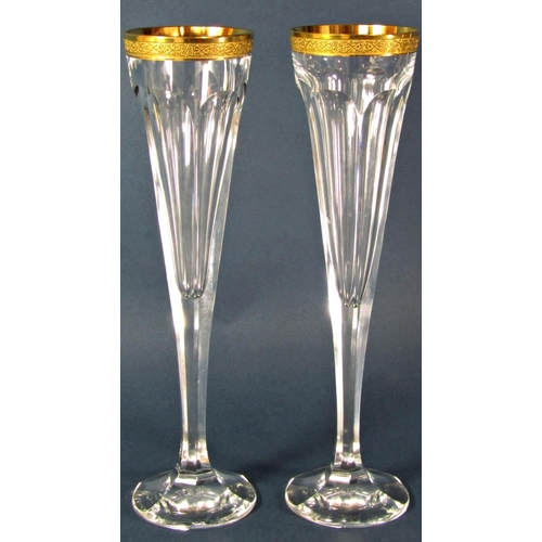 1174 - A pair of Moser hand cut facetted crystal Champagne flutes with 24 carat gold rim, made in Czechoslo... 