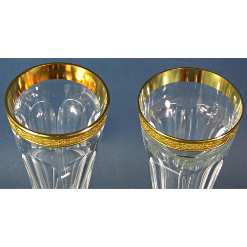 1174 - A pair of Moser hand cut facetted crystal Champagne flutes with 24 carat gold rim, made in Czechoslo... 