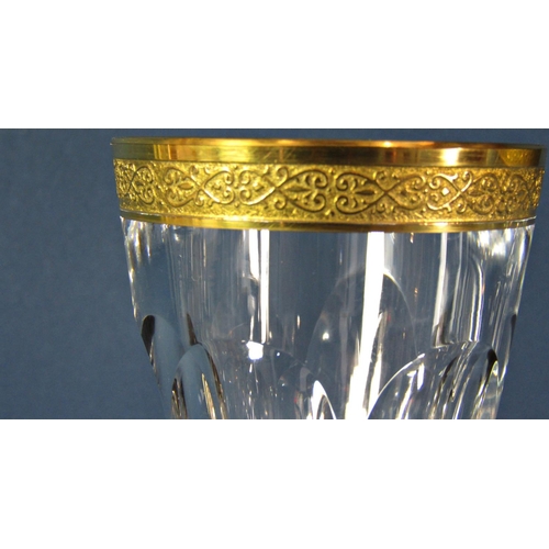 1174 - A pair of Moser hand cut facetted crystal Champagne flutes with 24 carat gold rim, made in Czechoslo... 