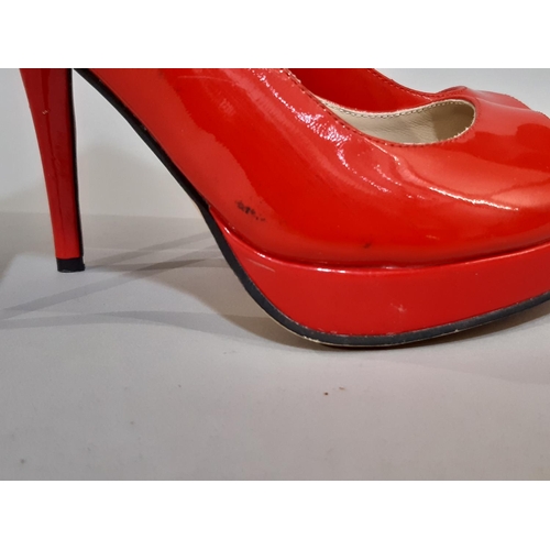 1616 - Pair of ladies shoes by Jimmy Choo in red patent leather, with peep toe and stiletto heel, size 39, ... 