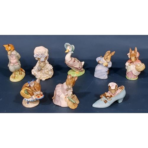 1085 - Eight Beswick Beatrix Potter figures with brown back stamps, to include Hunca Munca, Cottontail, Mrs... 