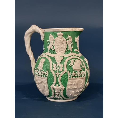 1129 - A Victorian smear glazed jug by Cobridge with relief detail The united Kingdom, 19th century blue an... 