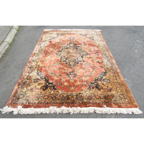 2549 - A modern Middle Eastern carpet with on overall floral pattern in pink and pale blue tones, 277cm x 1... 