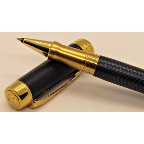 1548 - Parker Rollerball pen with blue feathered finish and gold coloured, box, paperwork and refill, unuse... 