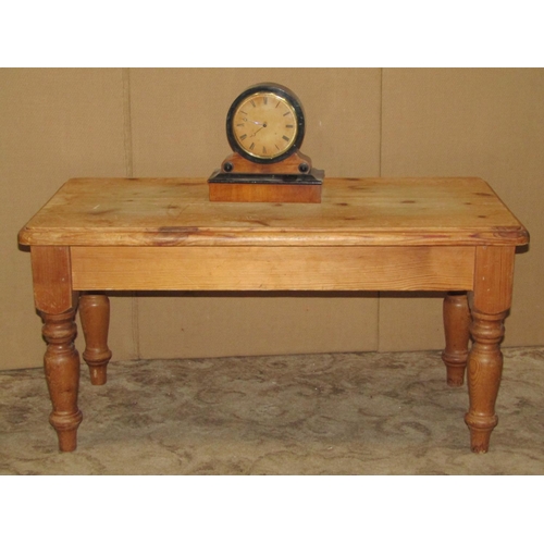 2319 - A 19th century rosewood foldover top tea table with scrolled frieze raised on a simple turned tapere... 