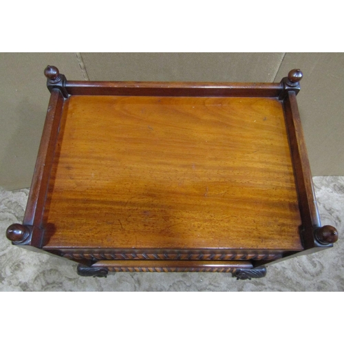 2325 - An Edwardian mahogany two tier tea trolley of rectangular form with gadrooned detail and incorporati... 