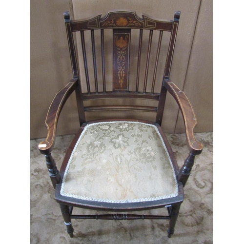 2339 - An inlaid Edwardian lightweight open elbow chair with rail back over an upholstered pad seat