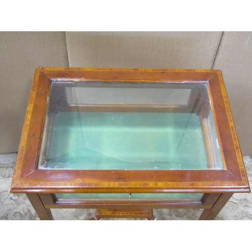 2340 - An Edwardian style vitrine/bijouterie table of rectangular form with glazed bevelled edge panelled h... 