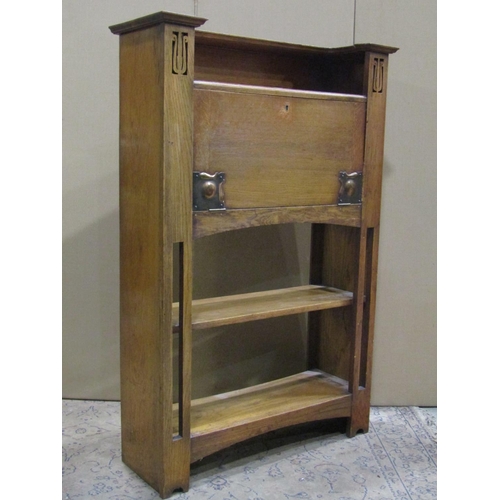 2447 - An Arts & crafts slim oak bureau bookcase combination with pierced detail, 82 cm wide x 30 cm deep x... 