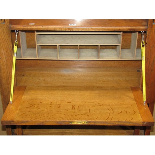 2447 - An Arts & crafts slim oak bureau bookcase combination with pierced detail, 82 cm wide x 30 cm deep x... 