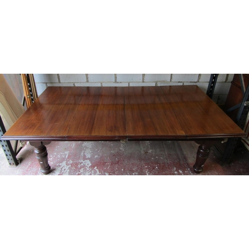 2661 - A late 19th century mahogany snooker table/dining table, the slate base raised on four turned and fl... 