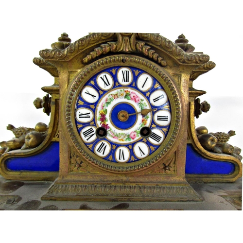 1491 - A Victorian gilt brass and porcelain panelled mantel clock with eight day striking movement