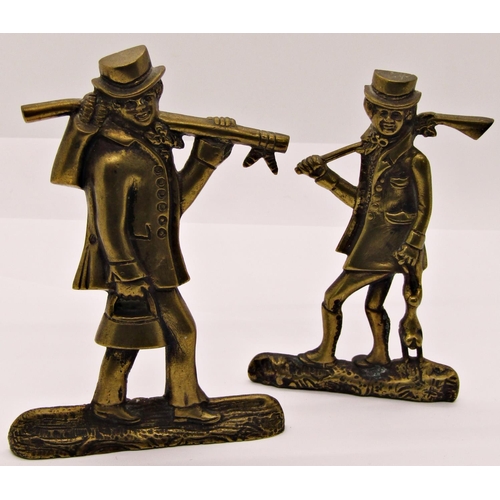 1533 - Two traditional embossed shot flasks and two 19th century cast brass chimney figures of sportsmen