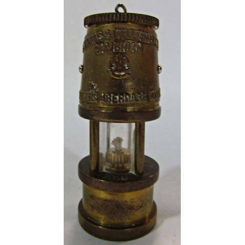 1691 - A Powell’s Tillery Steam Powered  Co Ltd miner’s lamp together with a J H Naylor Ltd of Wigan miner’... 