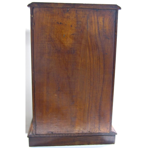 1705 - A Victorian oak smokers cabinet with a full glazed door revealing three drawers and three mixing pla... 